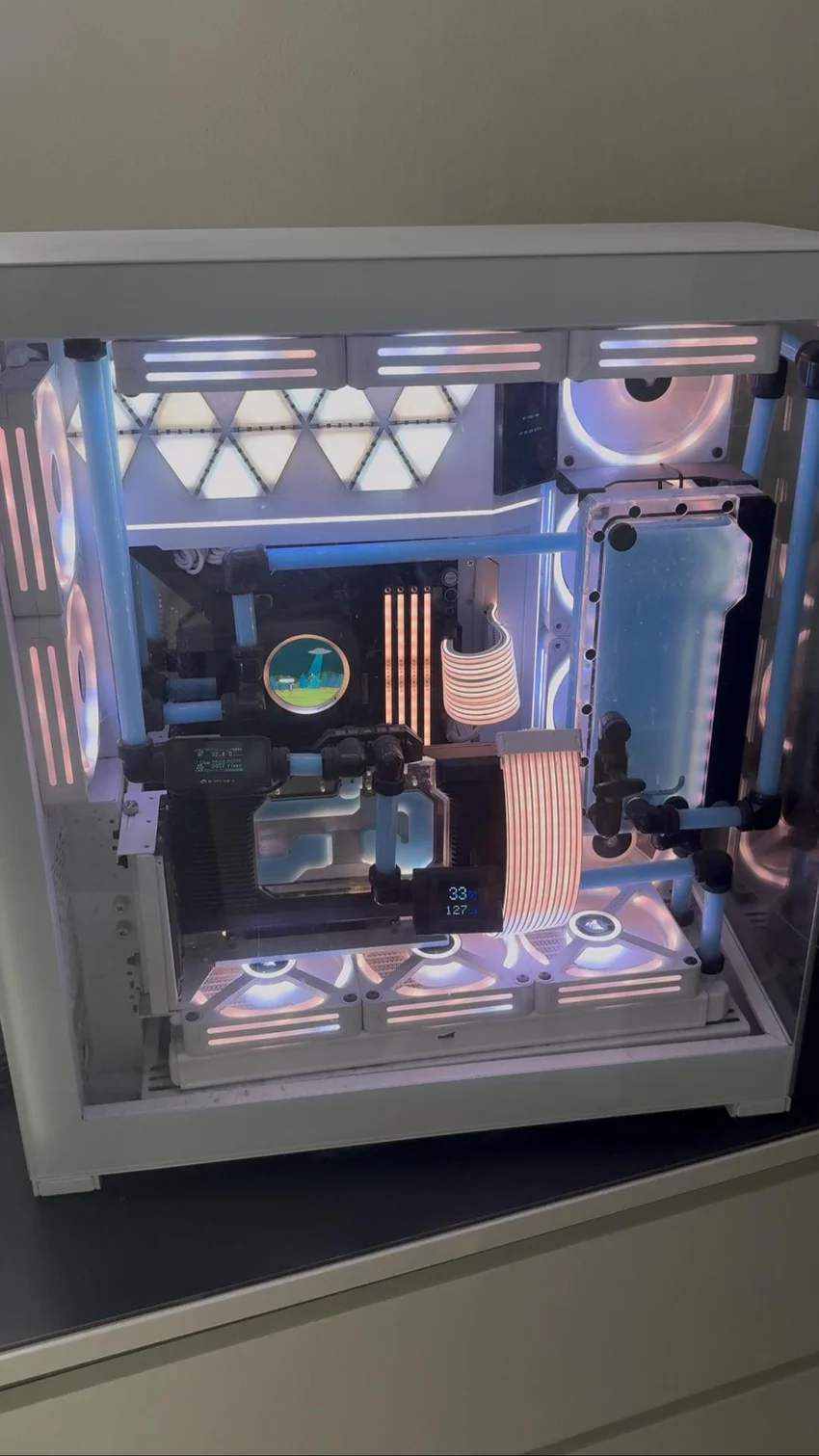 The fifteenth custom watercooled workstation, showing its compact loop and illuminated monitoring displays